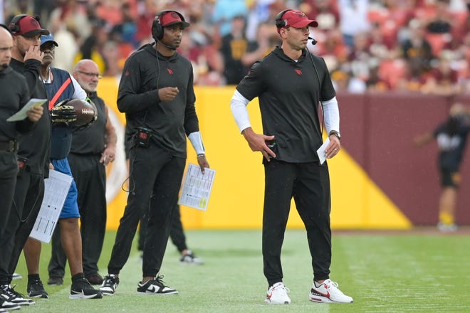 Sep 10, 2023; Landover, Maryland, USA; 
Arizona Cardinals head coach Jonathan Gannon looks onto the field during the second half against the Washington Commanders at FedExField. Mandatory Credit: Tommy Gilligan-USA TODAY Sports