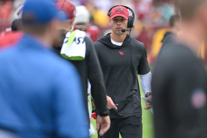Sep 10, 2023; Landover, Maryland, USA; Arizona Cardinals head coach Jonathan Gannon walks though the bench area during the second half against the Washington Commanders at FedExField. Mandatory Credit: Tommy Gilligan-USA TODAY Sports