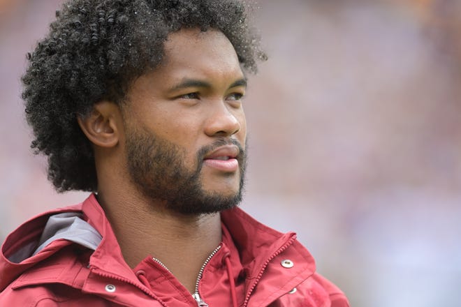 Sep 10, 2023; Landover, Maryland, USA; Arizona Cardinals quarterback Kyler Murray (1) stands in the bench area during the second half of the game against the Washington Commanders at FedExField. Mandatory Credit: Tommy Gilligan-USA TODAY Sports