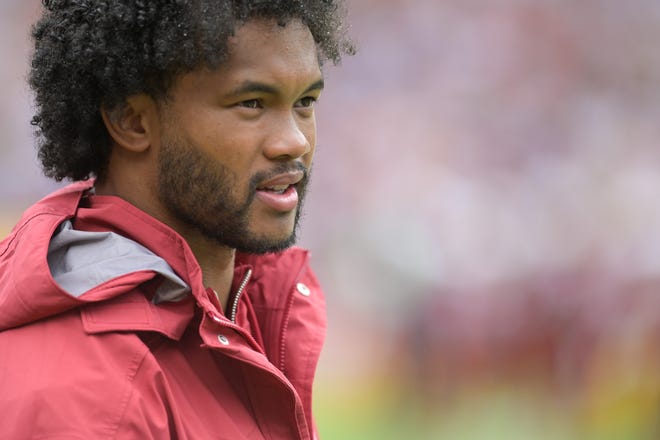 Sep 10, 2023; Landover, Maryland, USA; Arizona Cardinals quarterback Kyler Murray (1) stands in the bench area during the first half against the Washington Commanders at FedExField. Mandatory Credit: Tommy Gilligan-USA TODAY Sports